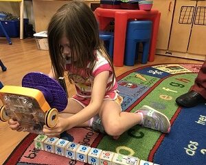 Little Girl Scanning Blocks with KIBO Image