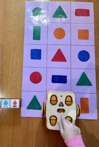Robots to teach coding through a floor map of answers