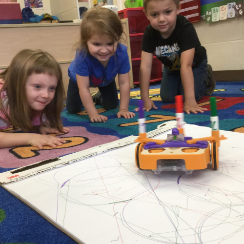 Group of children learning with KIBO