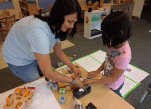 Amanda Sullivan and Young Student
